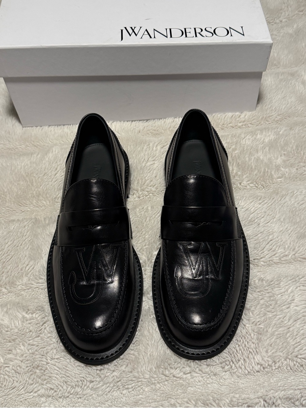 JW Anderson Black Embossed Logo Leather Penny Loafers